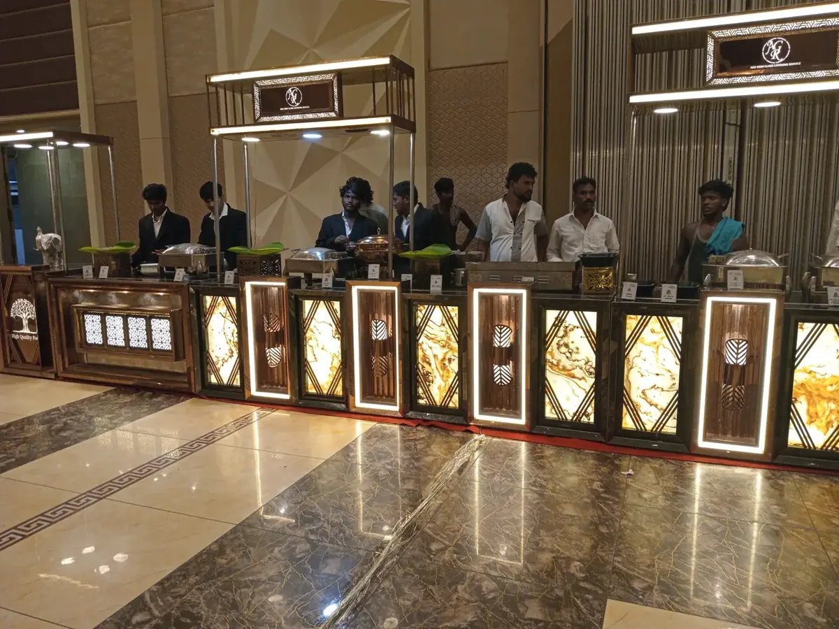 Buffet food counters set up for a function at Suganya Convention Centre, Pondicherry