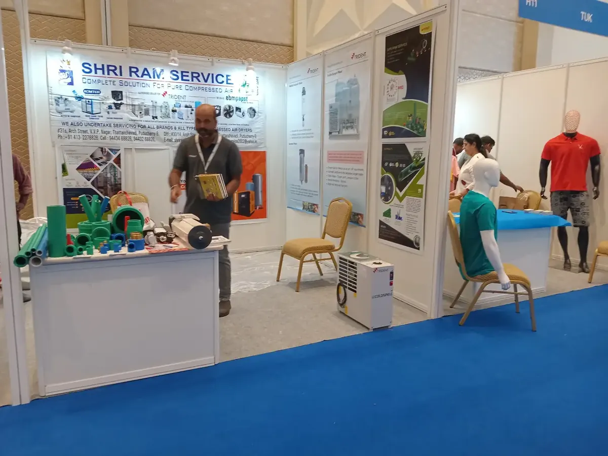 Exhibition stall with product displays at Suganya Convention Centre, Pondicherry