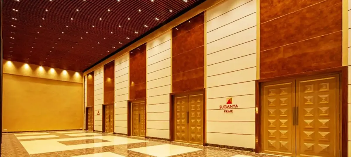 Banquet seating in the main hall at Suganya Convention Centre, Pondicherry