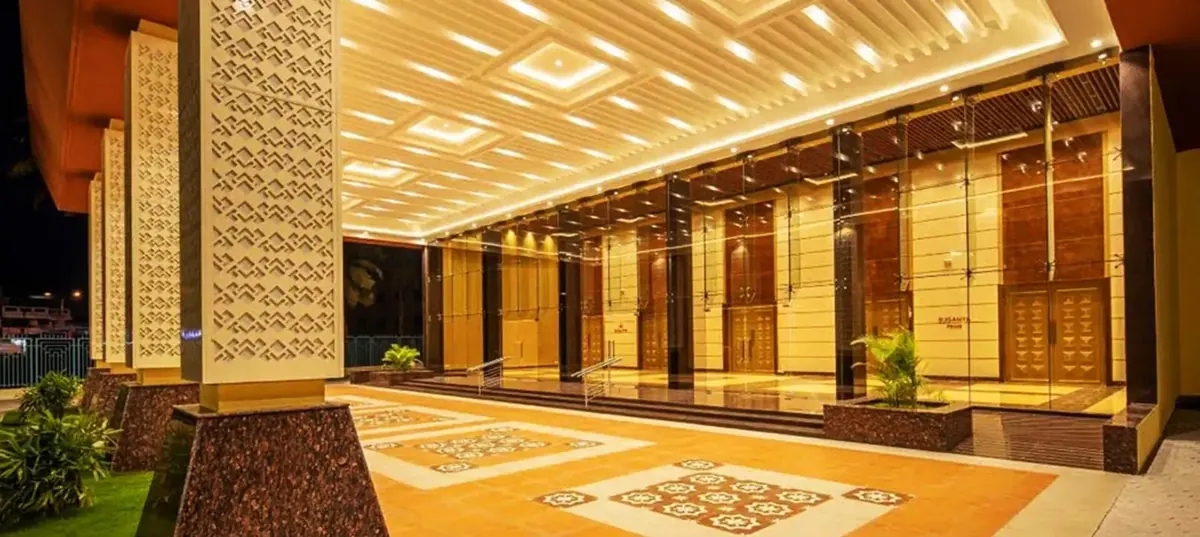 Glass-front pre-function lobby at Suganya Convention Centre, Pondicherry