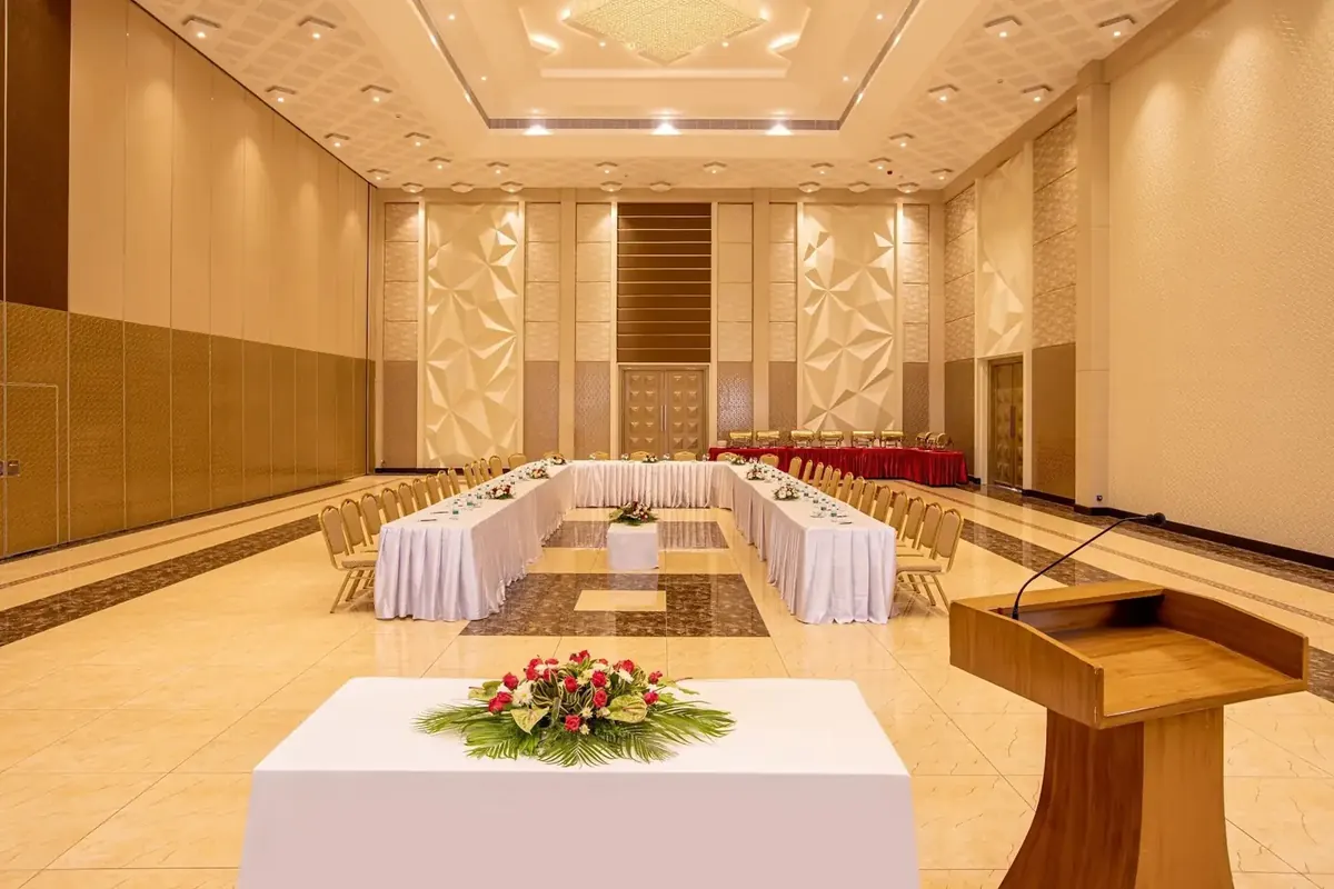 First-floor air-conditioned hall set for a small function, part of the convention centre in Pondicherry