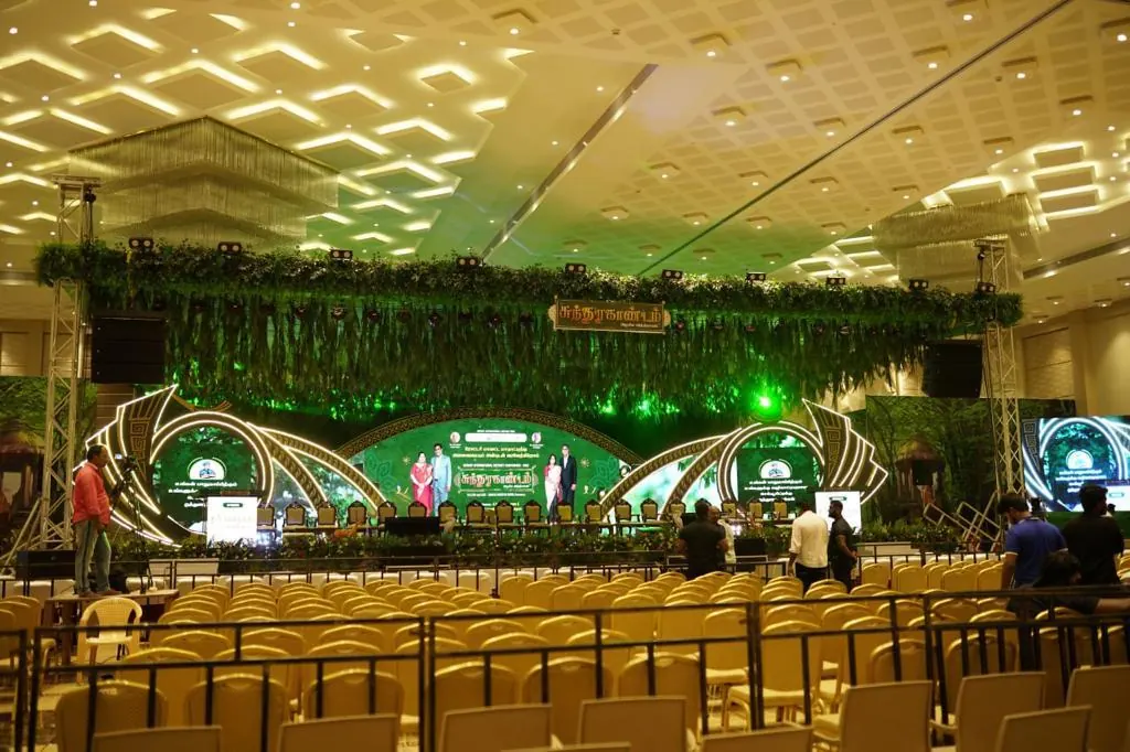 Grand decorated stage and seating for a public event, Suganya Convention Centre, Pondicherry